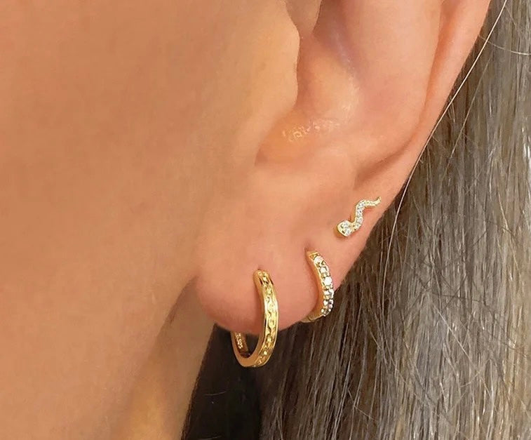 Snake diamond piercing