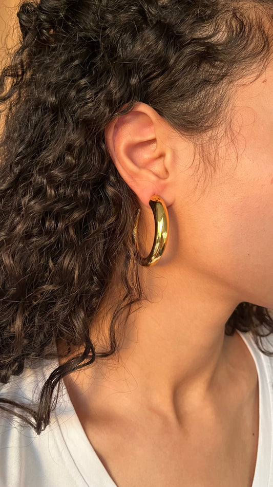 Large opened hoop earrings